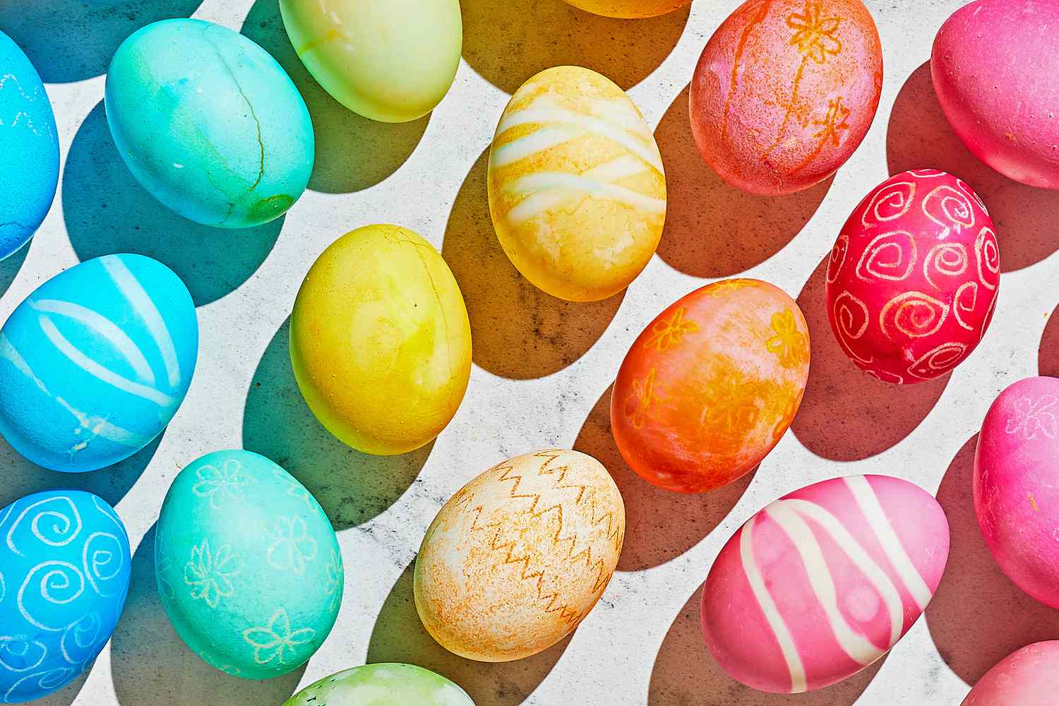Dyed Easter eggs in a variety of rainbow colors