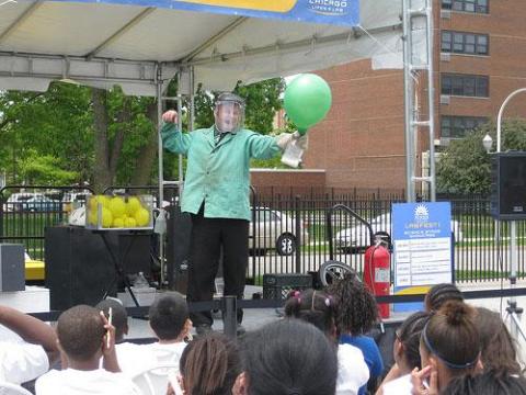 Steve Belliveau preforming a science experiment.