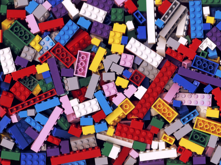 Pile of Lego bricks in all different colors and sizes.