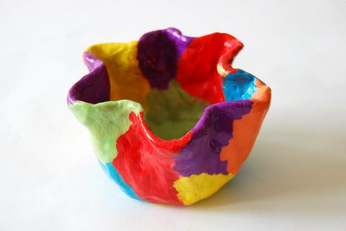 Multicolored clay pot with pinched edges